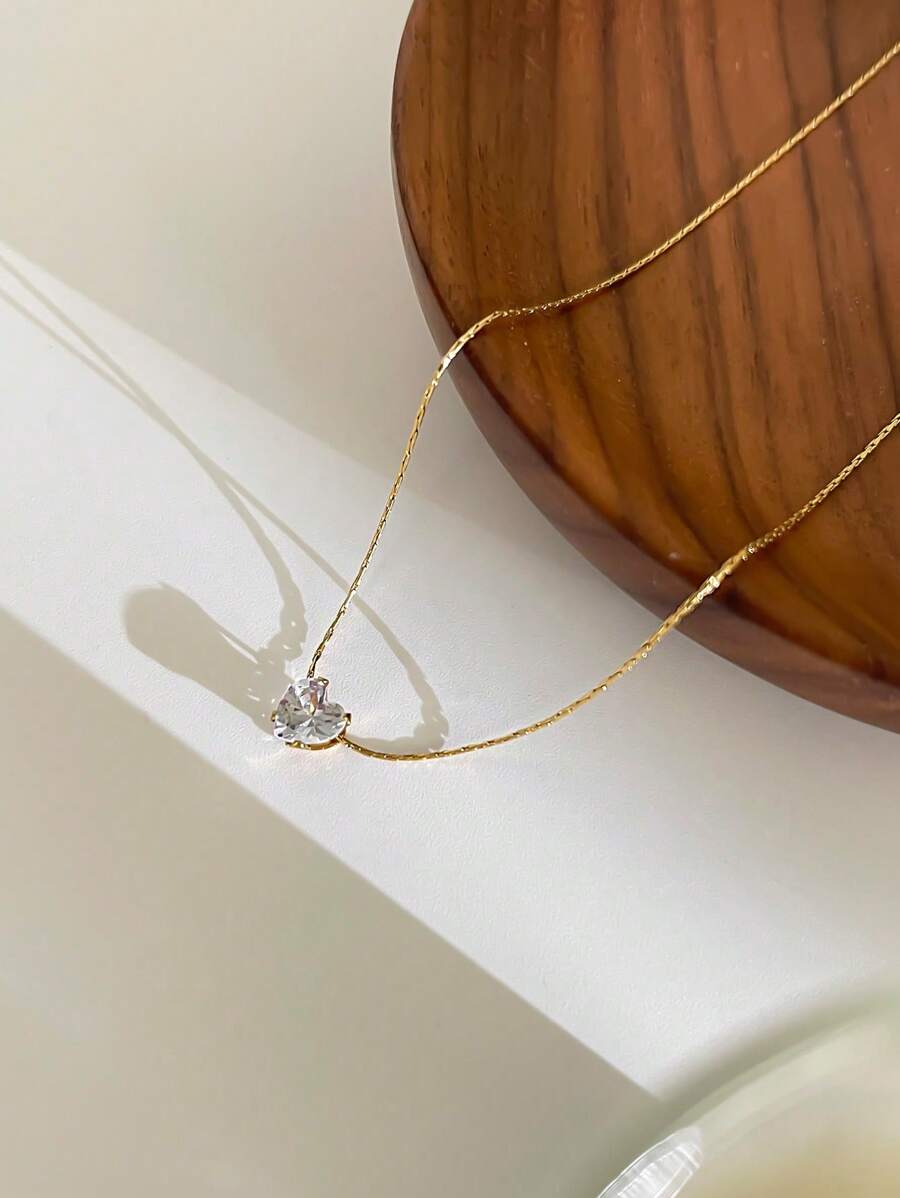 SHEIN قلادة ذهبية بفولاذ مقاوم للصدأ وحجر الراين