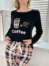 SHEIN Casual Underwear&Sleepwear طقم بيجامة بطبعة كرتونية وبنطلون مربعات بأكمام طويلة