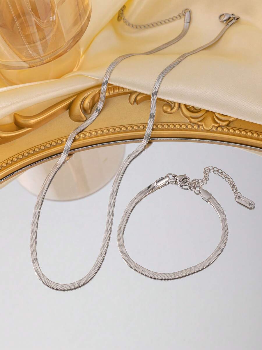 SHEIN طقم سلسلة وسوار فولاذ بتصميم عظم ثعبان