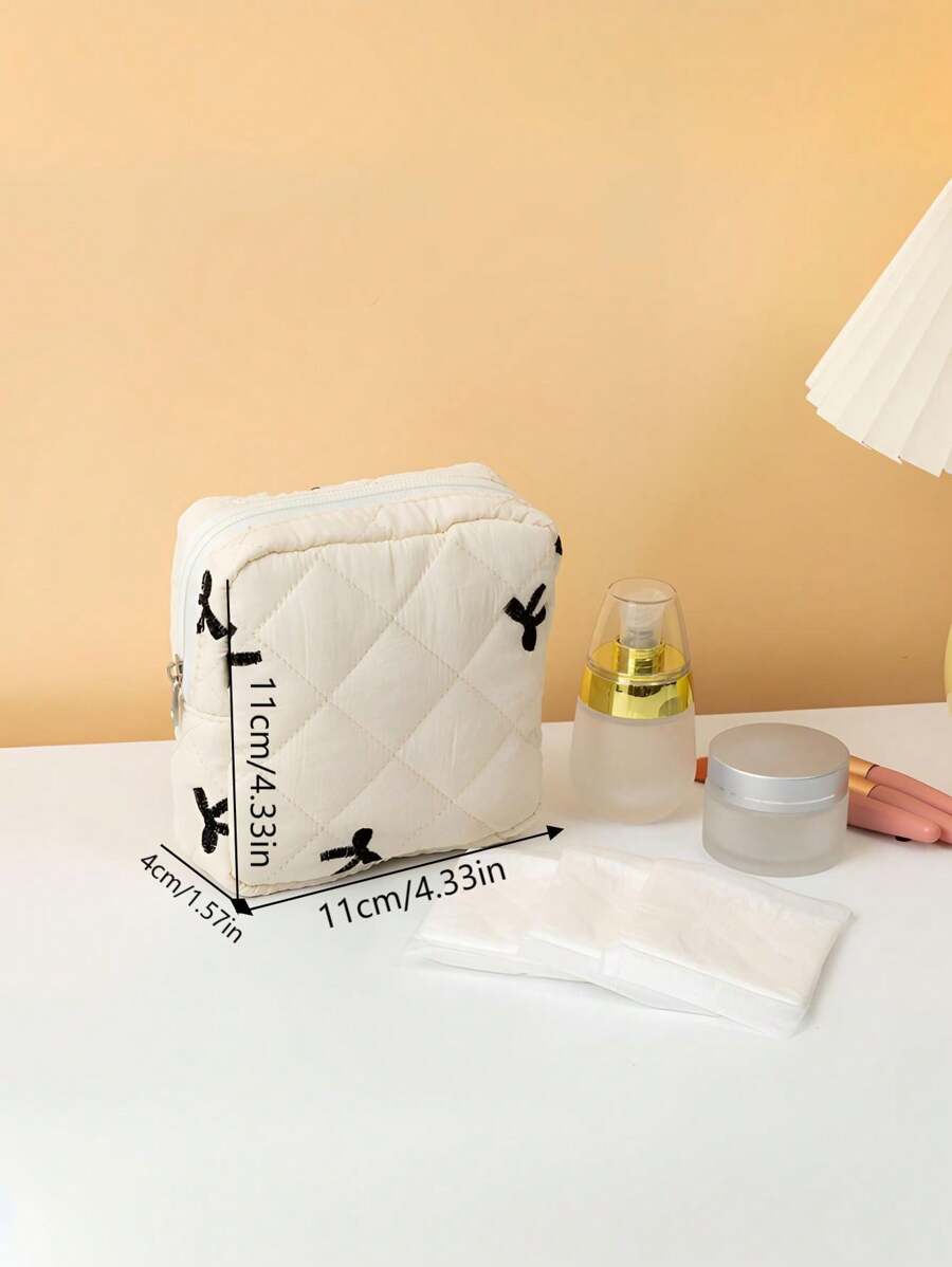 SHEIN حقيبة مكياج صغيرة محمولة بسحاب ونمط فيونكة