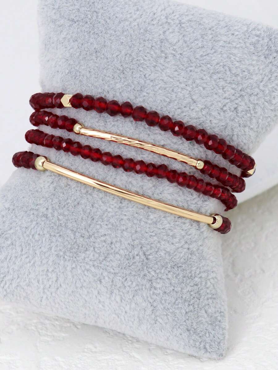 SHEIN طقم 4 أساور إيلاستيكية ذهبية من خرز بلوري أحمر