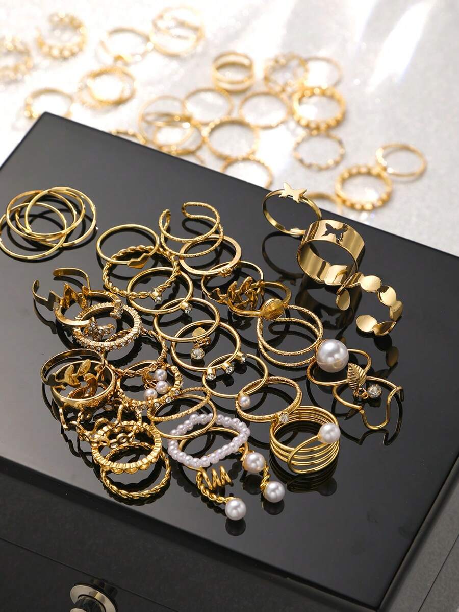 SHEIN طقم 64 خاتم معدني بتصاميم متنوعة