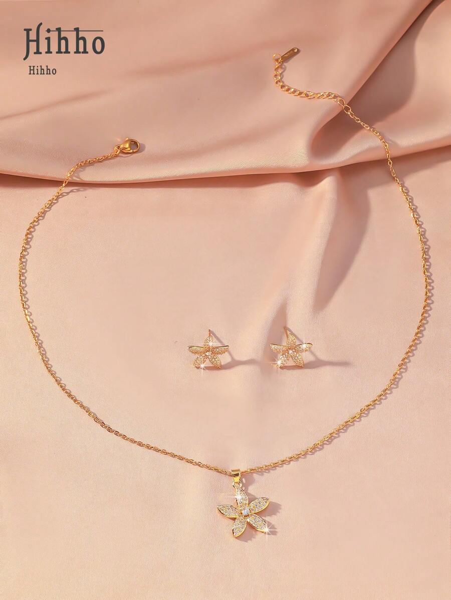 SHEIN مجموعة مجوهرات 3 قطع ذهبية بزهرات مرصعة بزركونيا