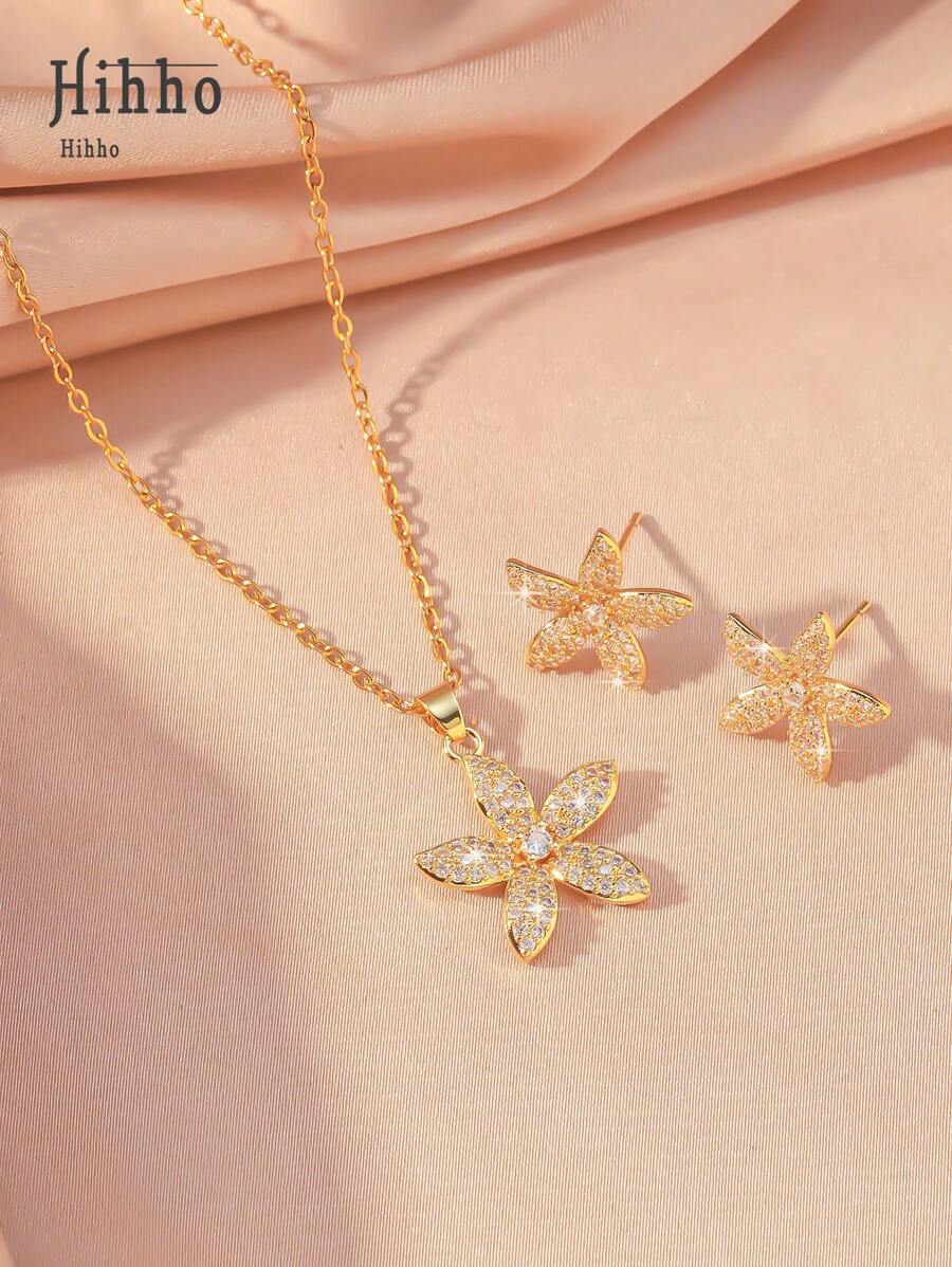 SHEIN مجموعة مجوهرات 3 قطع ذهبية بزهرات مرصعة بزركونيا