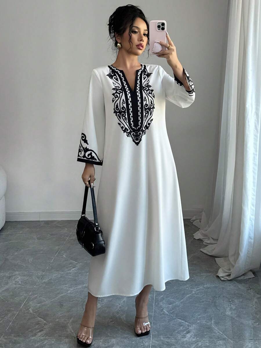 SHEIN Elenzga الرداء الطويل لموديلات النساء، موضة جديدة فضفاضة ذات طباعة عشوائية للسيدات
