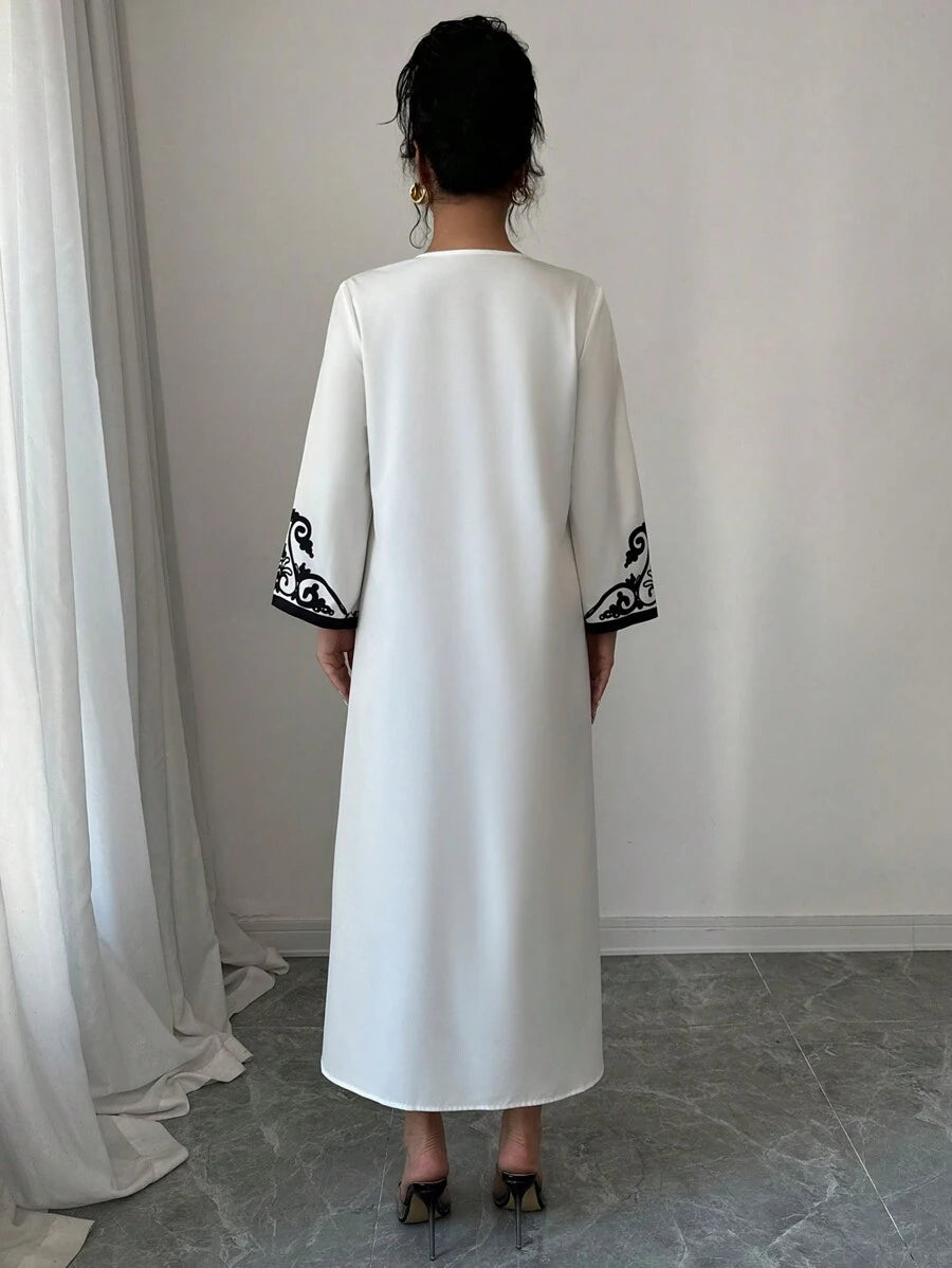 SHEIN Elenzga الرداء الطويل لموديلات النساء، موضة جديدة فضفاضة ذات طباعة عشوائية للسيدات