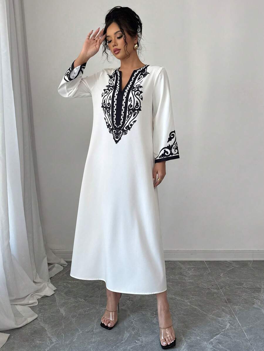SHEIN Elenzga الرداء الطويل لموديلات النساء، موضة جديدة فضفاضة ذات طباعة عشوائية للسيدات