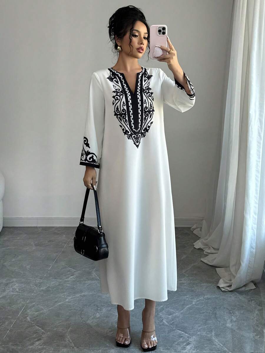 SHEIN Elenzga الرداء الطويل لموديلات النساء، موضة جديدة فضفاضة ذات طباعة عشوائية للسيدات