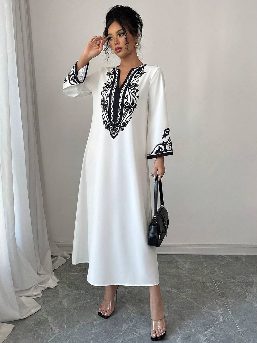 SHEIN Elenzga الرداء الطويل لموديلات النساء، موضة جديدة فضفاضة ذات طباعة عشوائية للسيدات