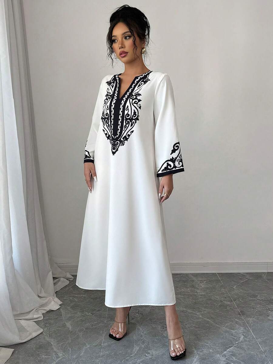SHEIN Elenzga الرداء الطويل لموديلات النساء، موضة جديدة فضفاضة ذات طباعة عشوائية للسيدات