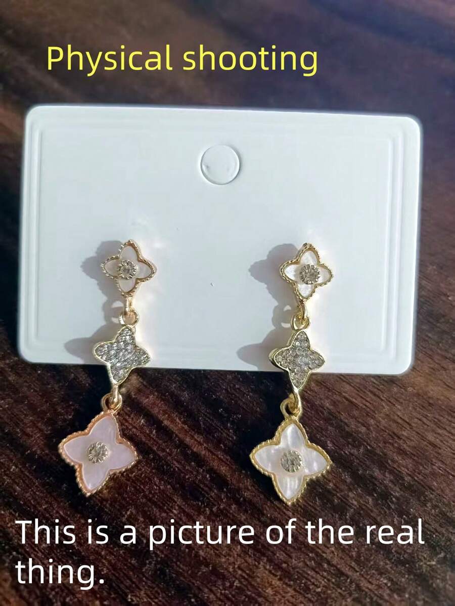 SHEIN زوج أقراط طويلة بأوراق وزهور مرصعة بالراين