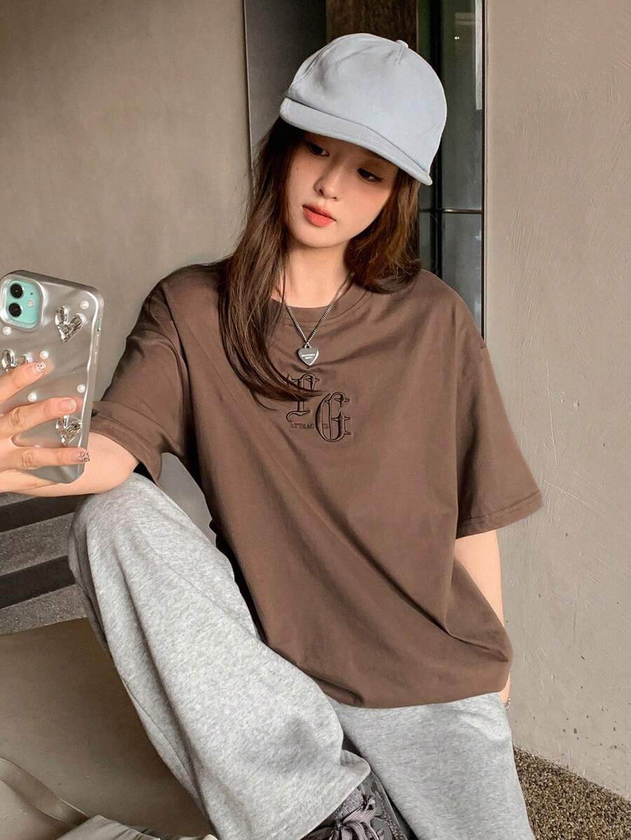 SHEIN DAZY تي شيرت أوفرسايز بطبعة حروف وكتف منسدل كاجوال