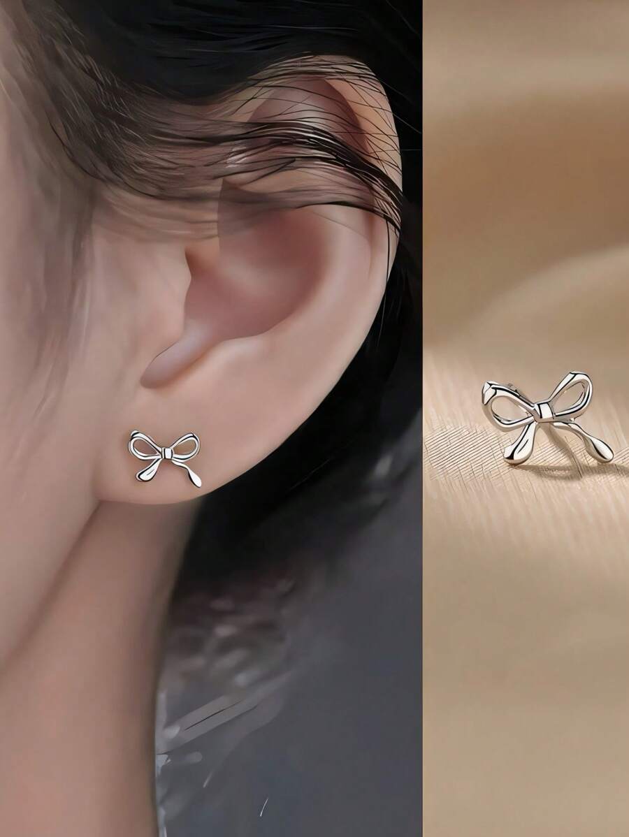 SHEIN زوج أقراط بتصميم فيونكة