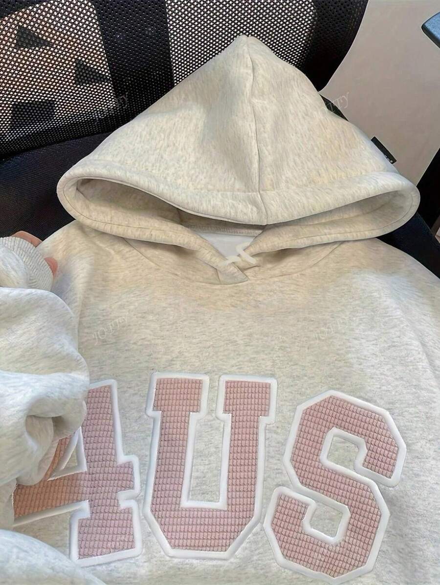 SHEIN هودي كاجوال بأكمام طويلة وجيب أمامي بلون سادة