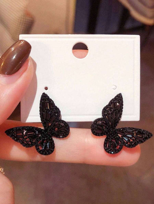 SHEIN زوج أقراط فراشة عصرية بحشوة سوداء