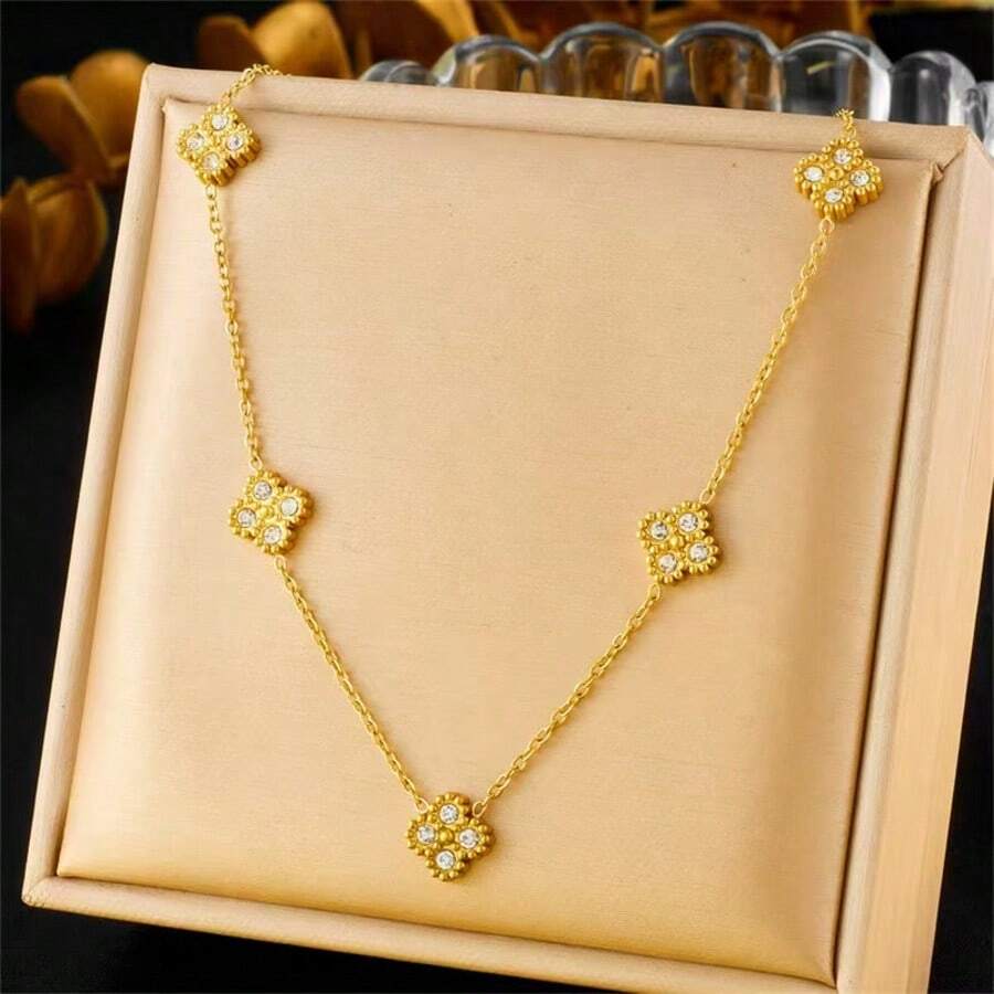 SHEIN طقم مجوهرات سلسلة وأقراط زهرة ذهبية مرصعة بالراين ستون