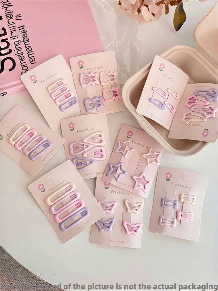 SHEIN مجموعة 40 مشبك شعر بشكل قلب ونجمة للسيدات