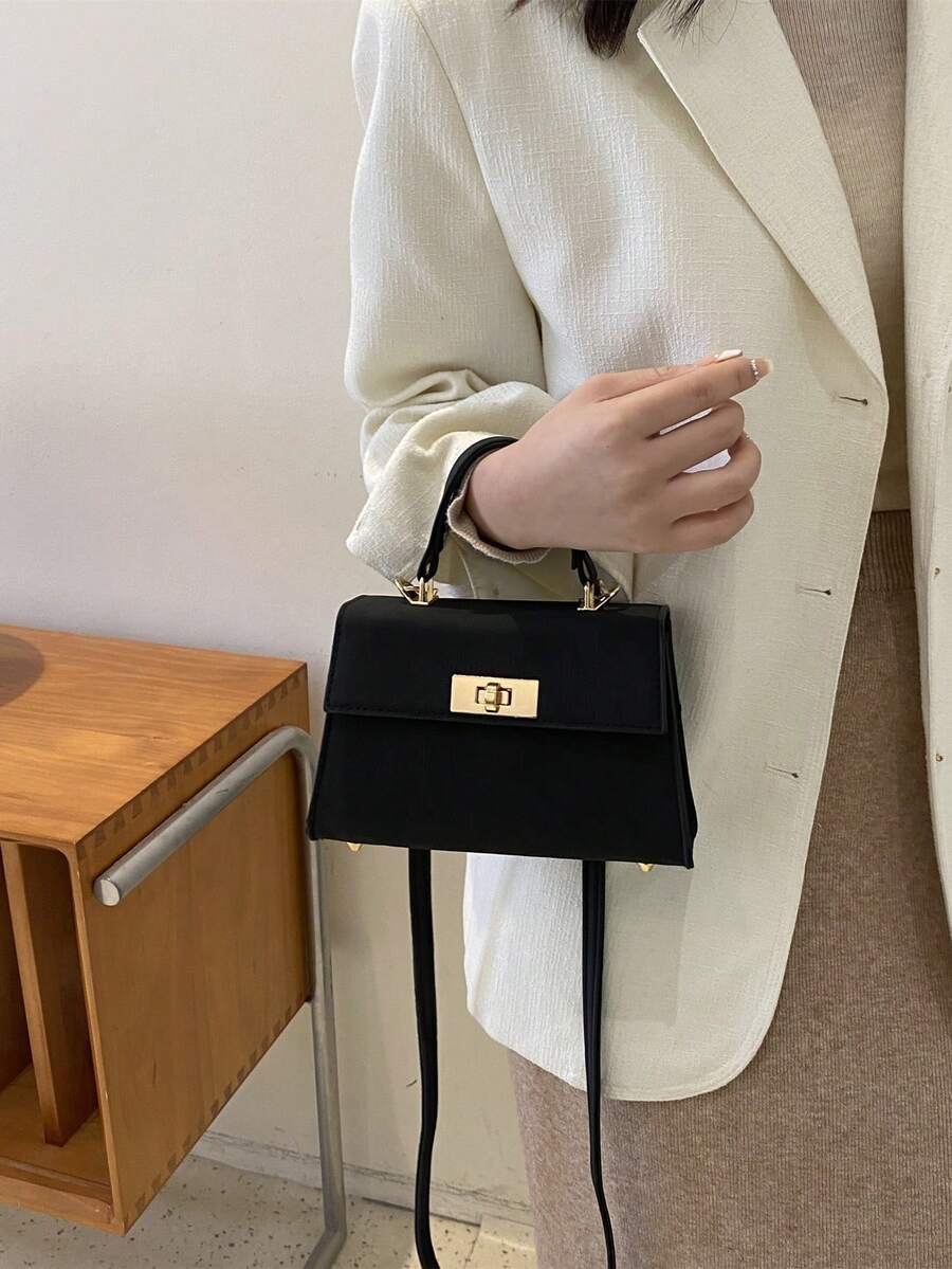 SHEIN حقيبة يد من البولي يوريثان بلون أسود بغطاء معدني مبروم