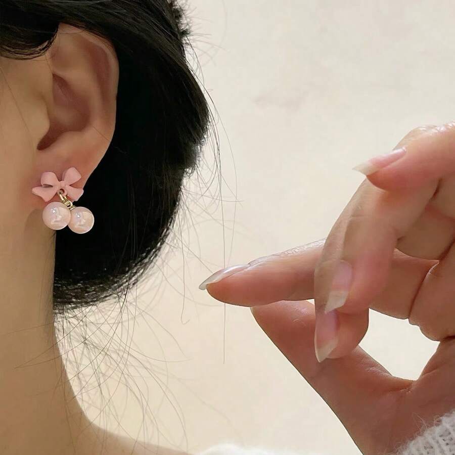 SHEIN زوج أقراط بفيونكة وردية ولؤلؤ