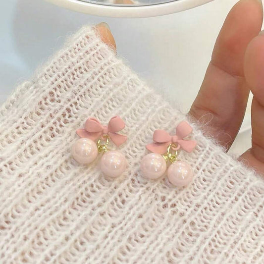 SHEIN زوج أقراط بفيونكة وردية ولؤلؤ