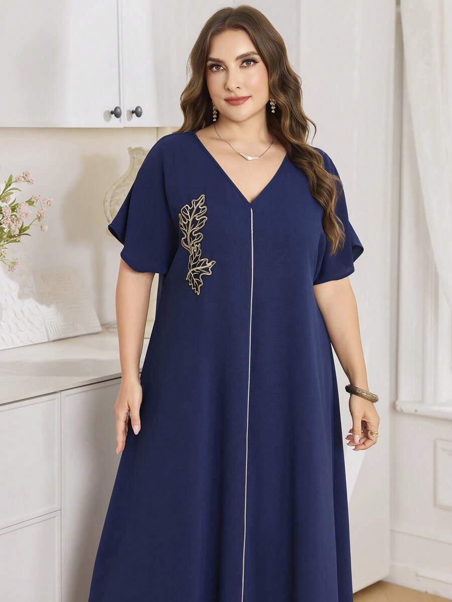 SHEIN Al Najma قميص تونيك أزرق قصير بأكمام قصيرة كبير الحجم