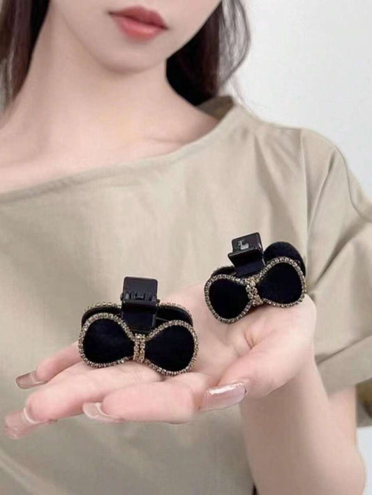 SHEIN مجموعة 2 مشابك شعر سوداء بشكل فراشة مزينة بالراين