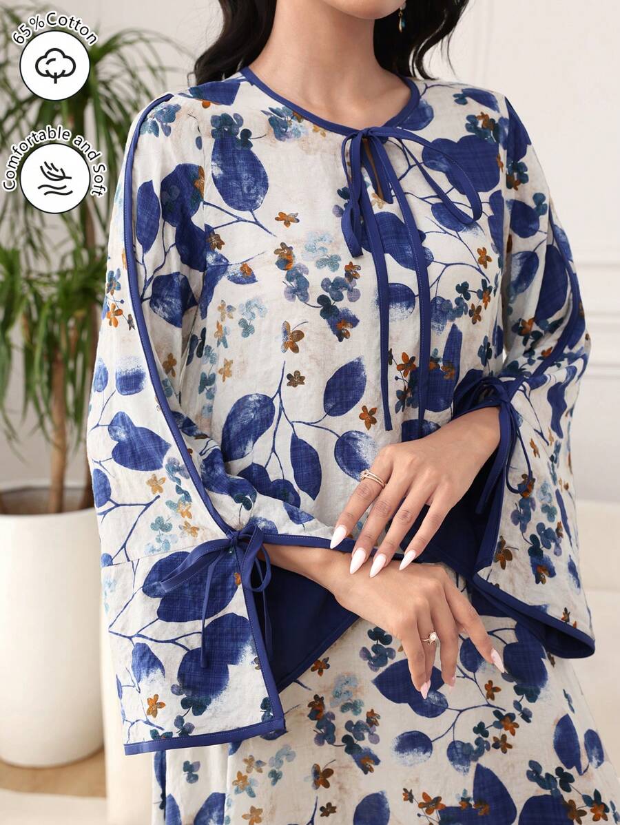 SHEIN Al Najma فستان فضفاض ازرق بطبعة نباتية وأكمام متسعة