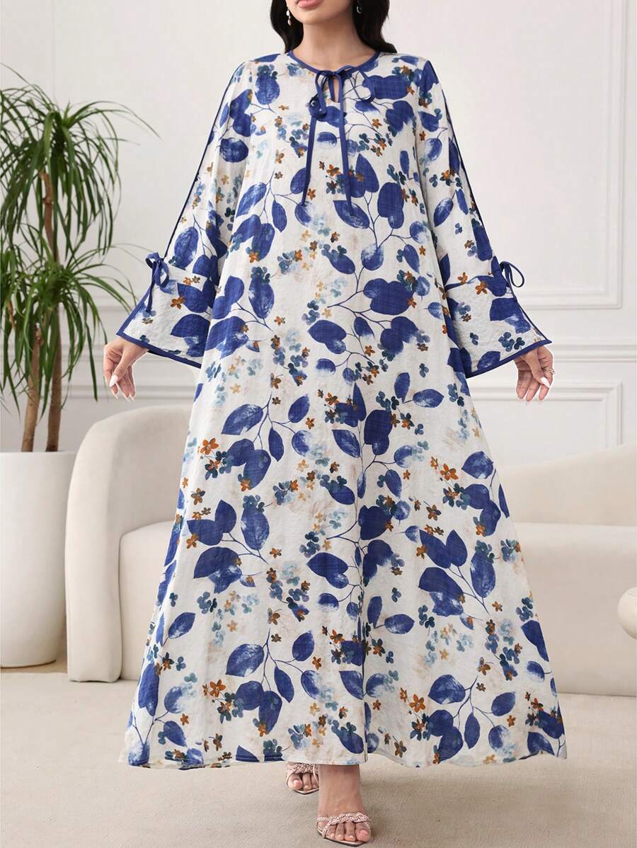 SHEIN Al Najma فستان فضفاض ازرق بطبعة نباتية وأكمام متسعة