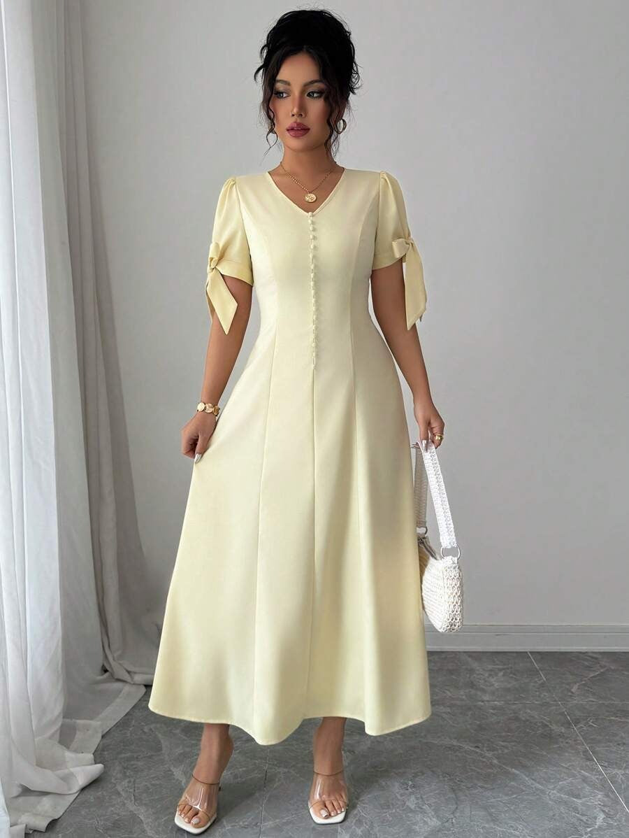 SHEIN Elenzga فستان طويل أصفر بأزرار وفيونكة من الاكتاف