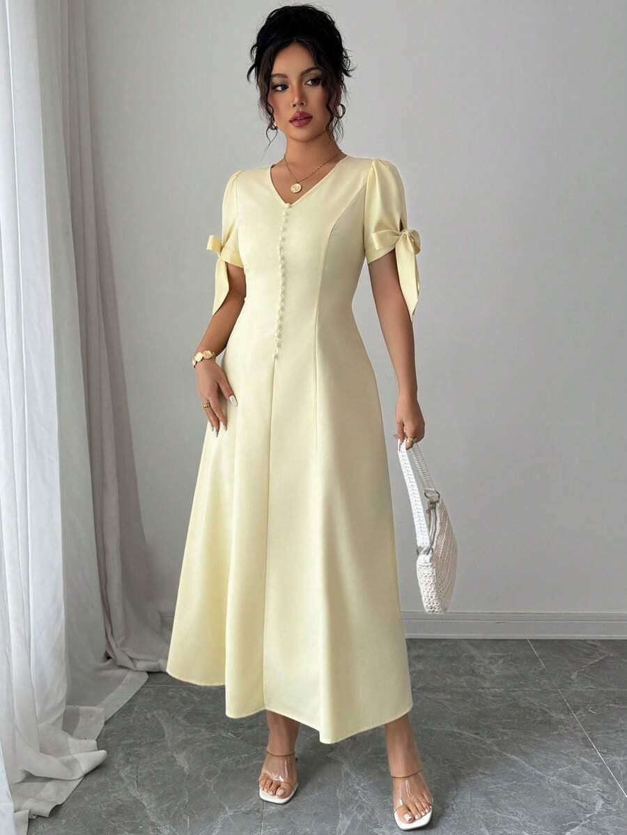 SHEIN Elenzga فستان طويل أصفر بأزرار وفيونكة من الاكتاف