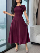 SHEIN Feyla فستان متوسط الطول بياقة دائرية وأكمام قصيرة مزين بفيونكة
