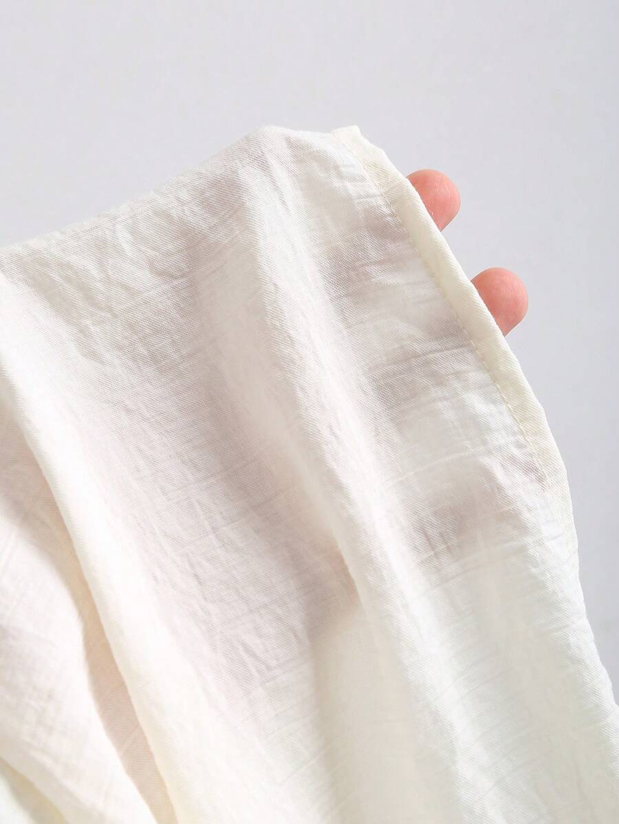 SHEIN Sweetra تنورة طويلة بخصر مطاطي وورود وشراريب بلون مشمشي
