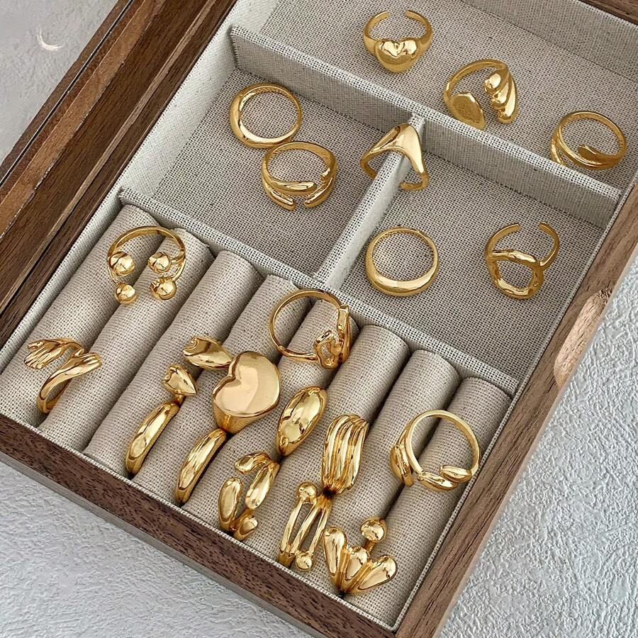 SHEIN طقم 10 خواتم ذهبية معدنية باشكال هندسية