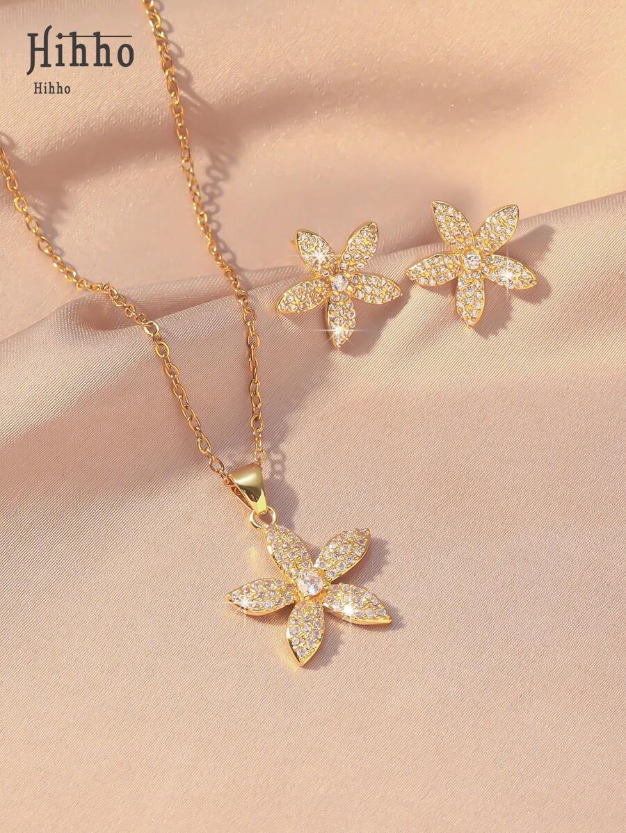 SHEIN مجموعة مجوهرات 3 قطع ذهبية بزهرات مرصعة بزركونيا