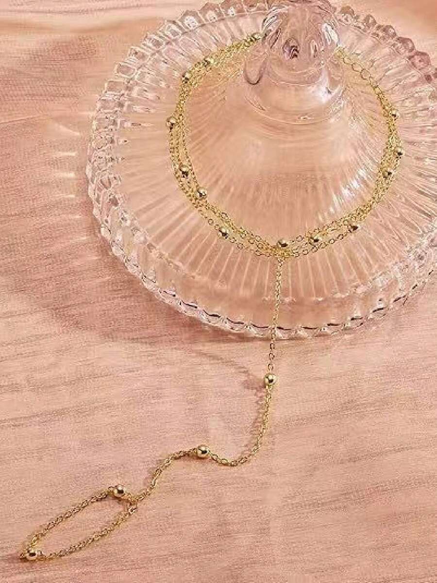 SHEIN سوار أصبع من الستانلس ستيل بسلسلة خرز اللؤلؤ الأنيق