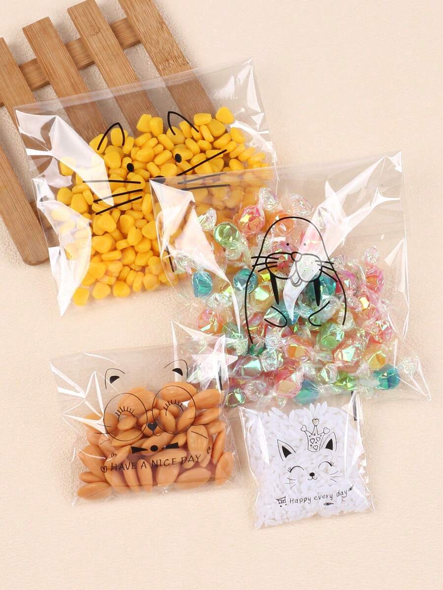 SHEIN كيس خبز شفاف 100 قطعة ذاتي اللصق بتصميمات كرتونية