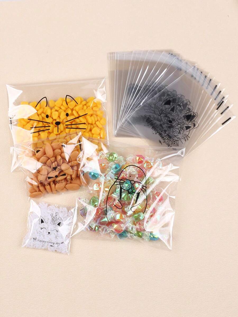 SHEIN كيس خبز شفاف 100 قطعة ذاتي اللصق بتصميمات كرتونية