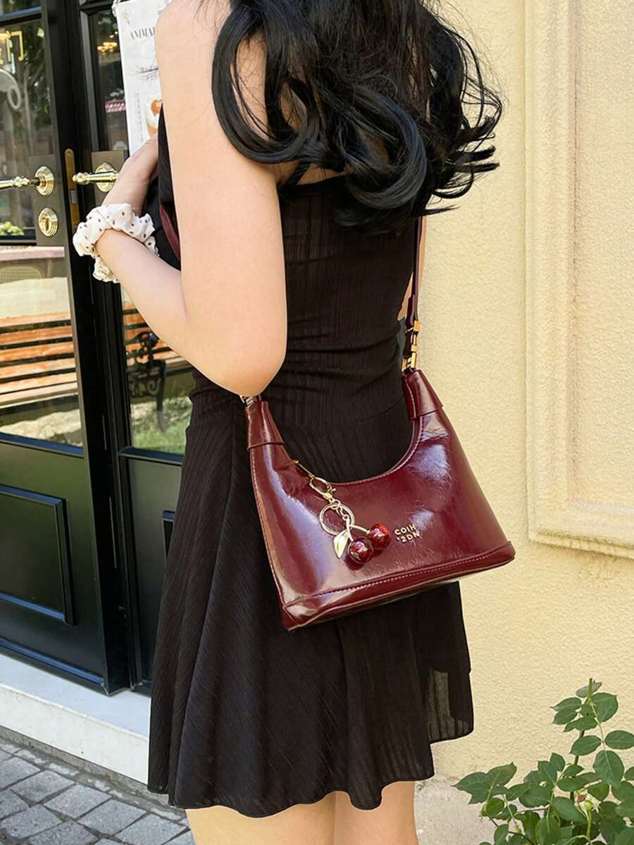 SHEIN حقيبة يد بتصميم الدمية بحزام للكتف باللون العنابي
