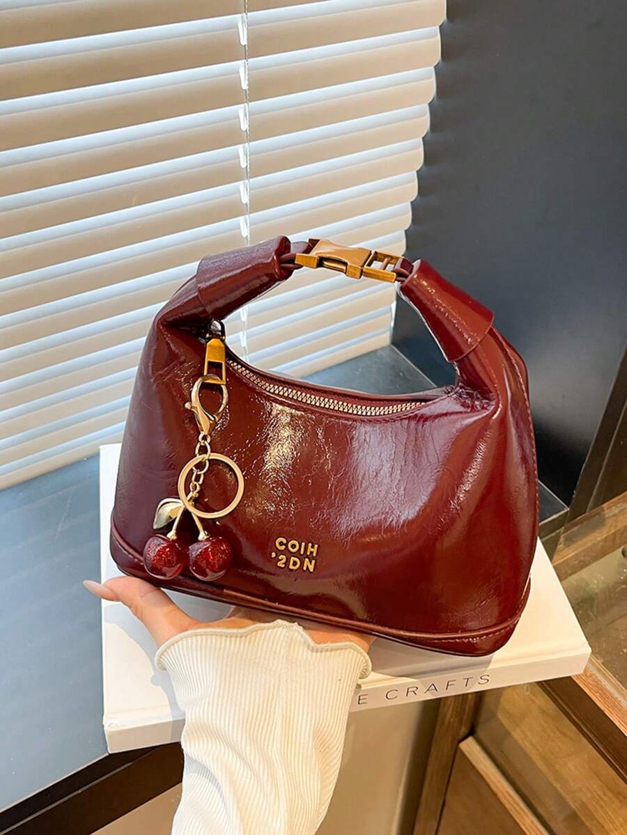 SHEIN حقيبة يد بتصميم الدمية بحزام للكتف باللون العنابي