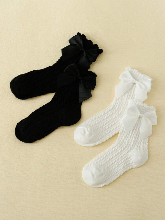 SHEIN طقم 4 جوارب بنات قصيرة سوداء وبيضاء مزينة بفيونكة