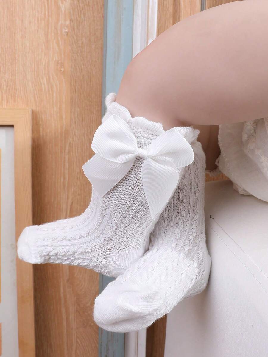 SHEIN طقم 4 جوارب بنات قصيرة سوداء وبيضاء مزينة بفيونكة