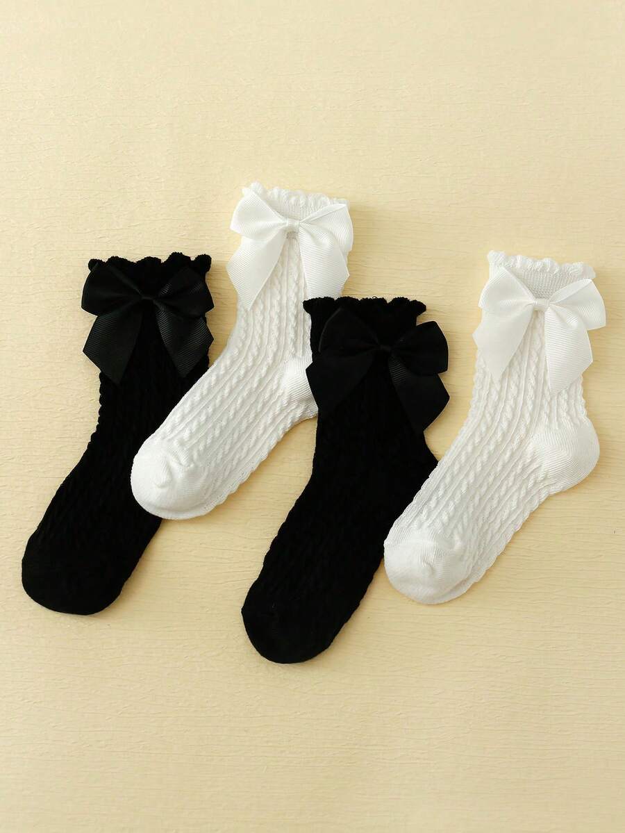 SHEIN طقم 4 جوارب بنات قصيرة سوداء وبيضاء مزينة بفيونكة