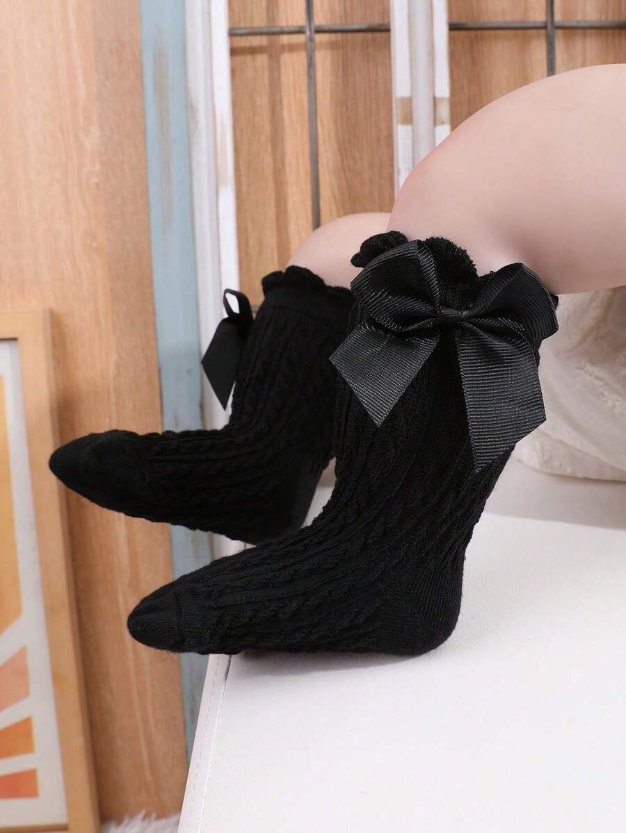 SHEIN طقم 4 جوارب بنات قصيرة سوداء وبيضاء مزينة بفيونكة