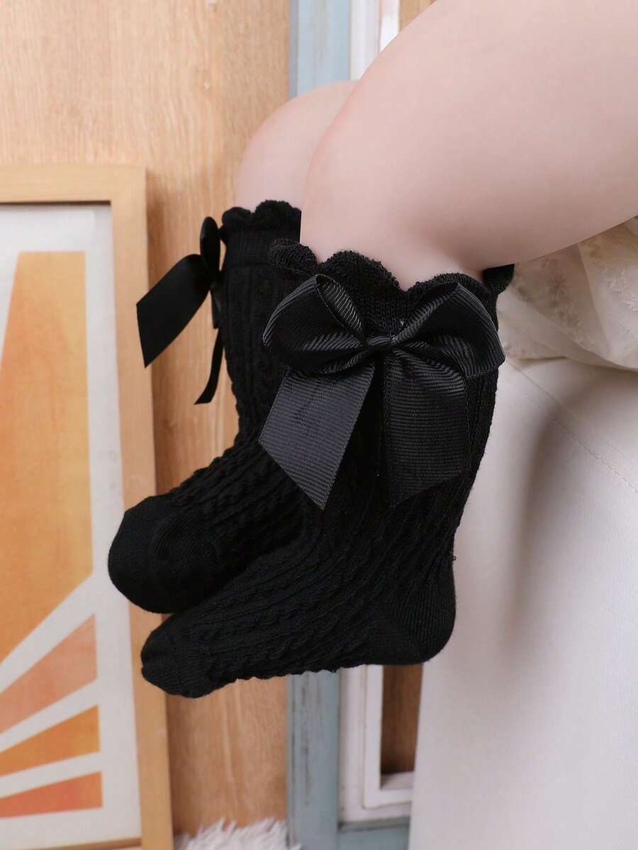 SHEIN طقم 4 جوارب بنات قصيرة سوداء وبيضاء مزينة بفيونكة