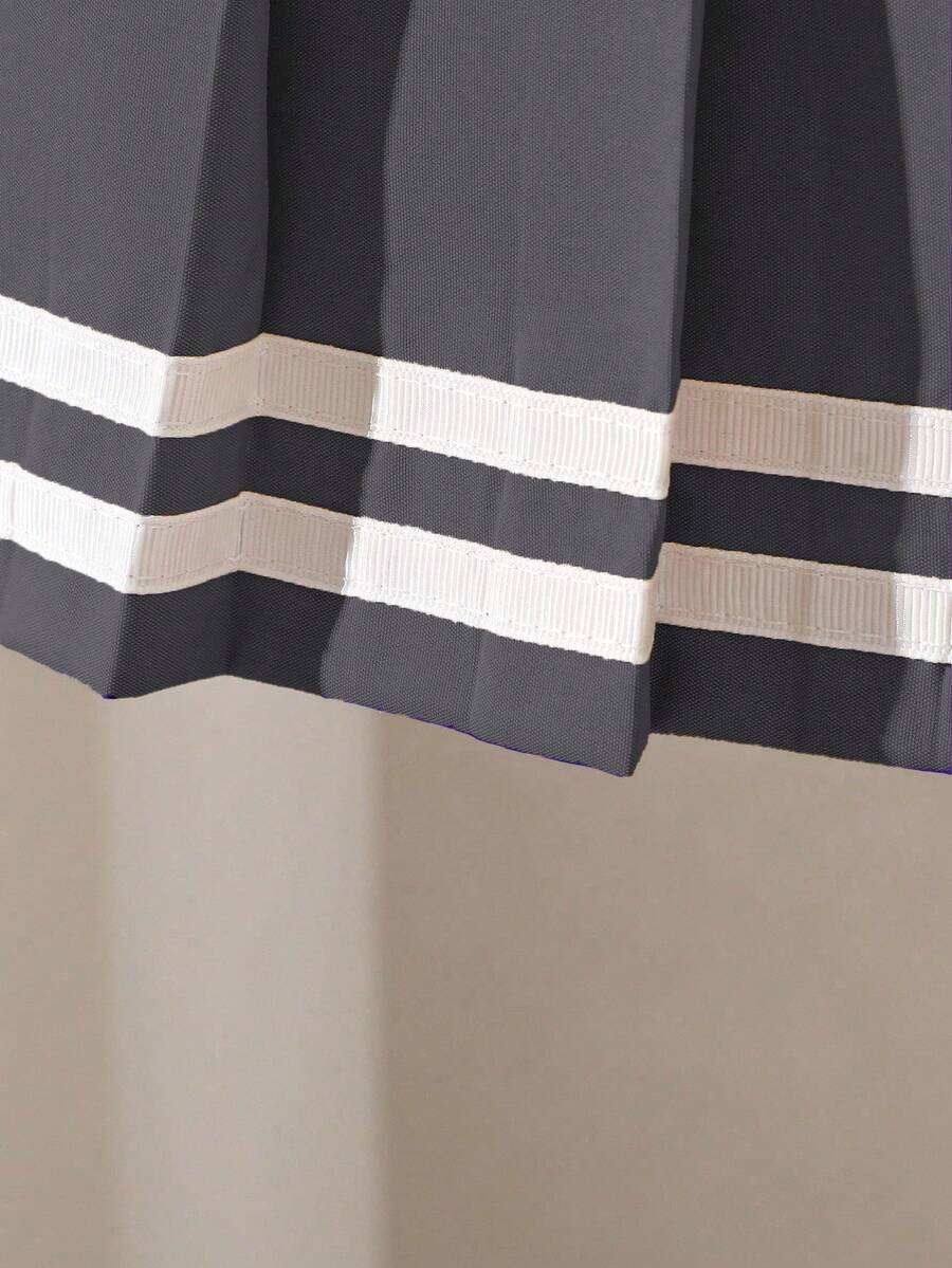 SHEIN تنورة مطوية مزينة بشريط للفتيات الصغيرات
