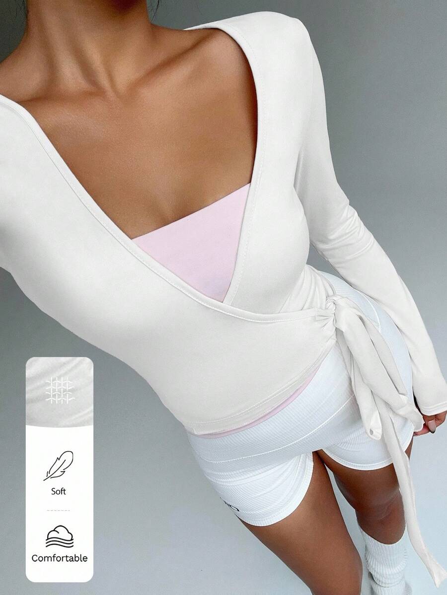 SHEIN FavEase توب قصير وردي بأكمام طويلة مرن لليوجا واللياقة