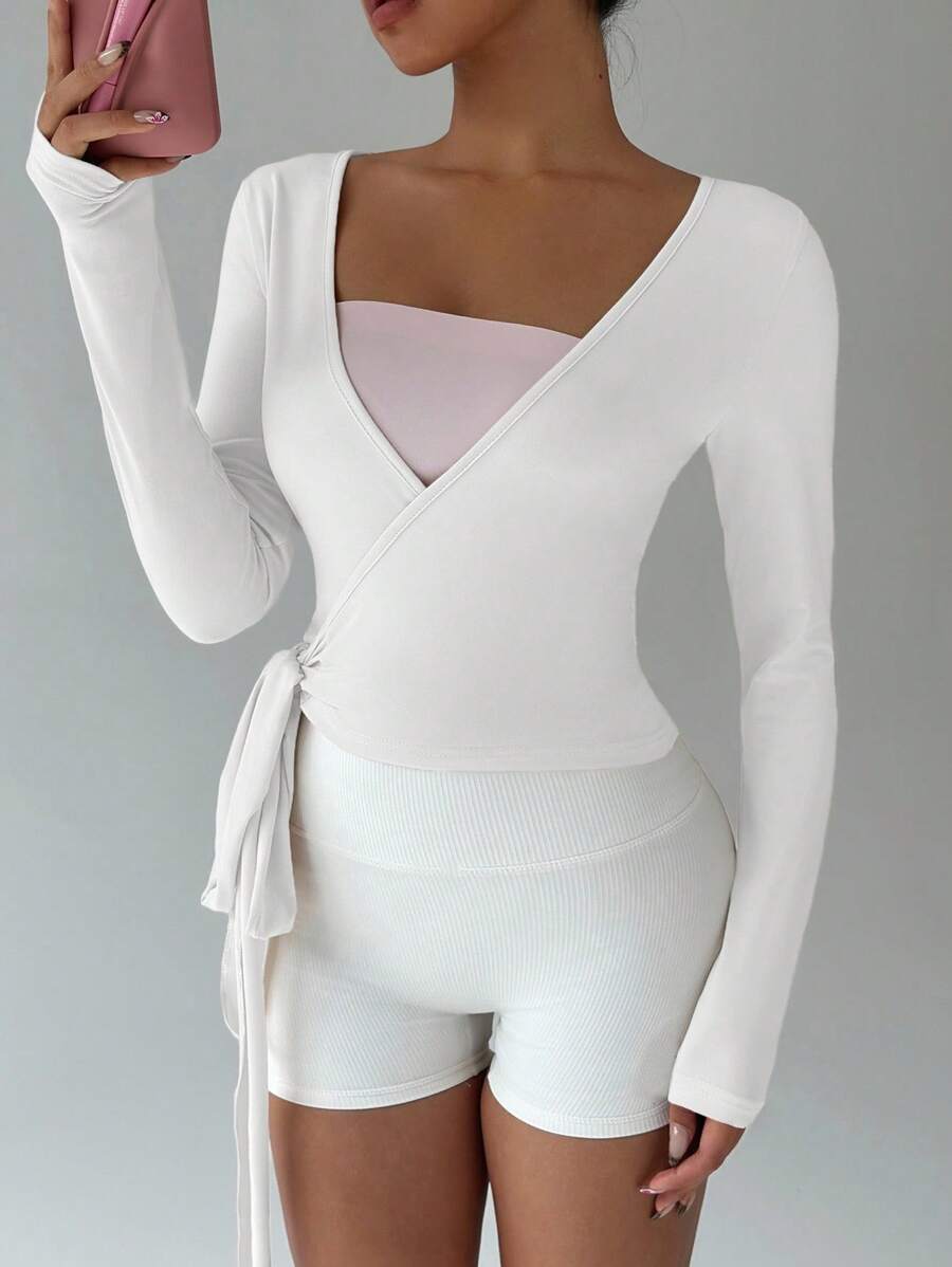 SHEIN FavEase توب قصير وردي بأكمام طويلة مرن لليوجا واللياقة