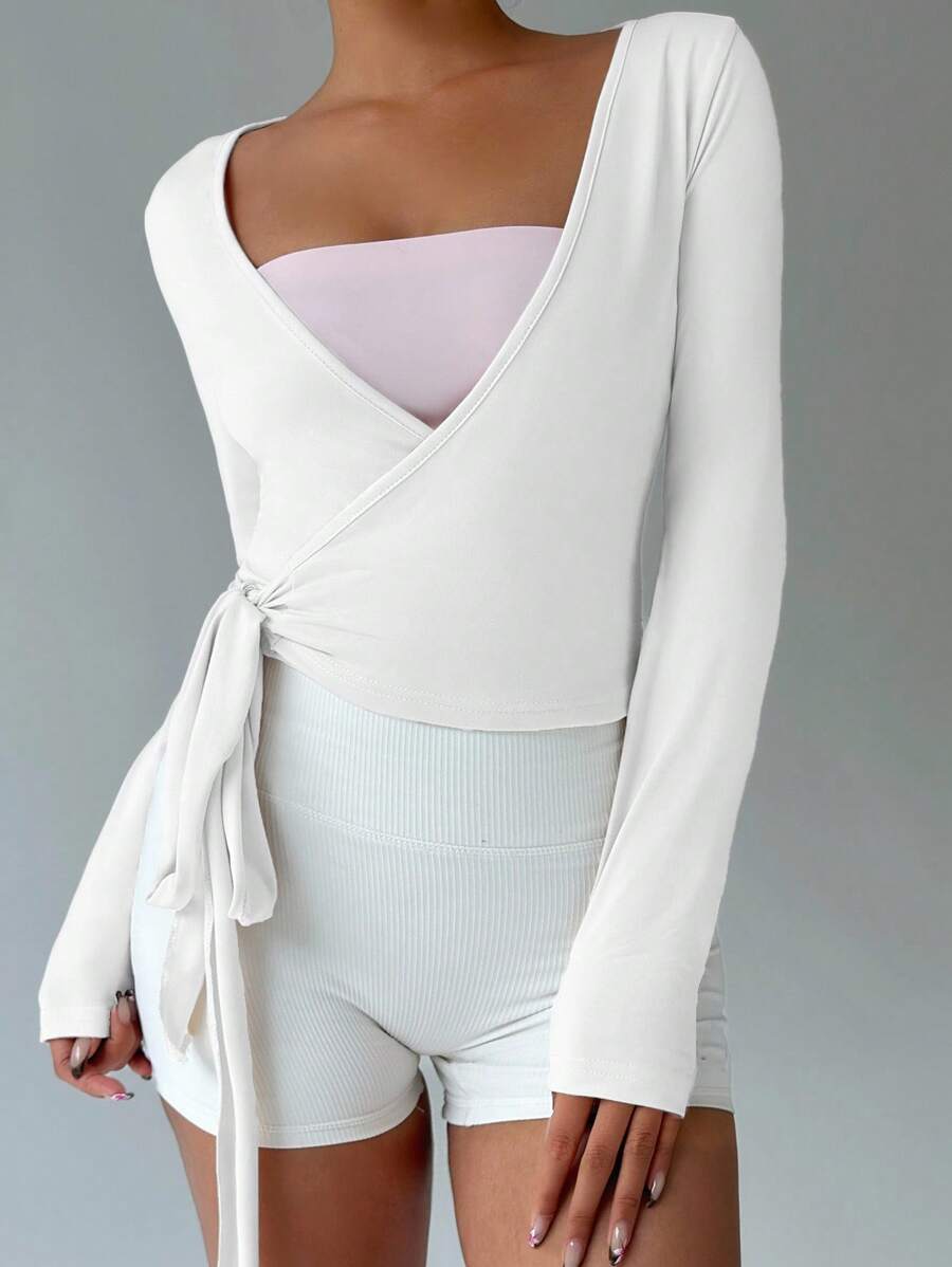 SHEIN FavEase توب قصير وردي بأكمام طويلة مرن لليوجا واللياقة
