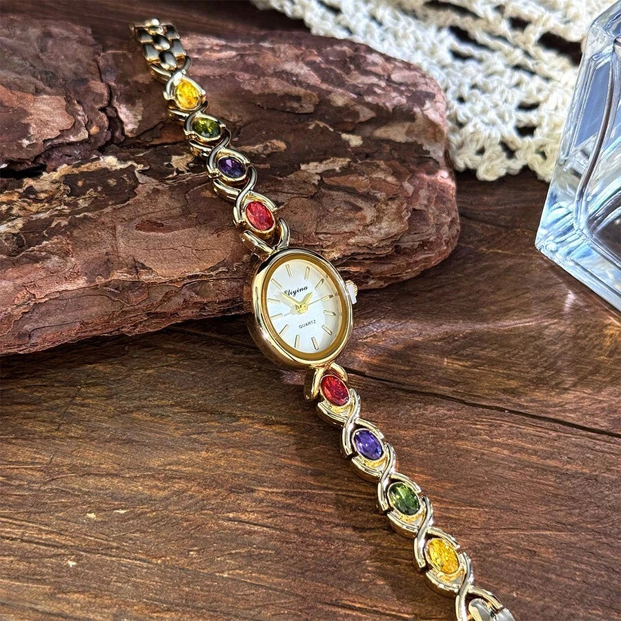 SHEIN ساعة كوارتز نسائية فاخرة بسلسلة ملونة وأحجار كريمة بيضاوية
