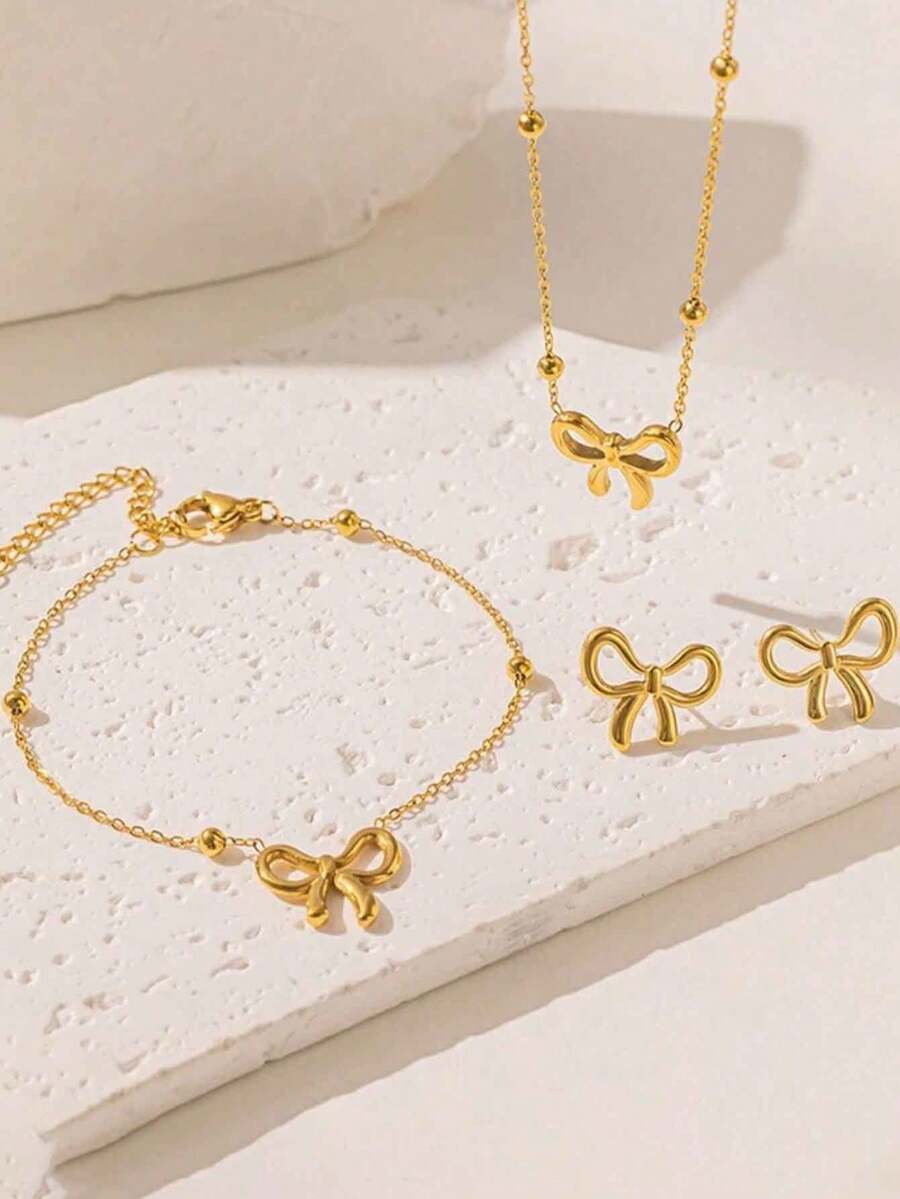 SHEIN طقم مجوهرات 3 قطع فولاذ مطلي ذهب 18 قيراط بتصميم فيونكة